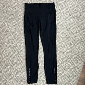 Lululemon black leggings, size 6, ankle length, side stash pockets
